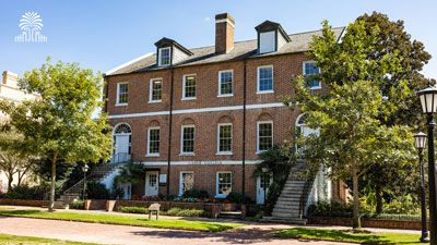 Lieber College on the Horseshoe with tree and gates mark.