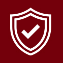 Garnet background with white shield with a check icon representing insurance