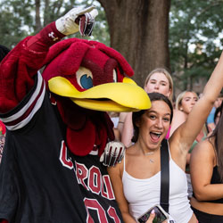 Students get hugs from Cocky during First Night celebration