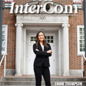 front cover of Intercom with Emmie Thompson standing in front of the SJMC building