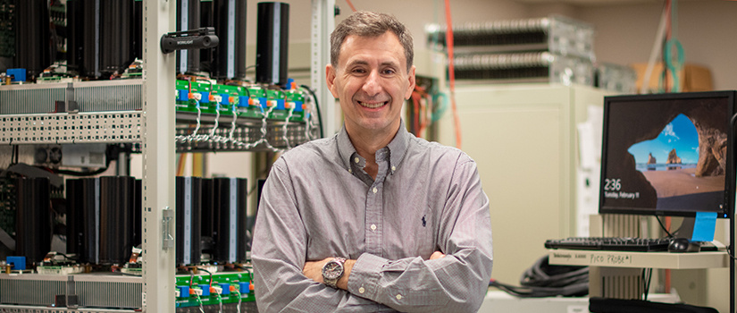 Ginn stands in his lab.