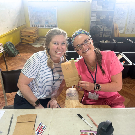 Haley and colleague at pharmacy station