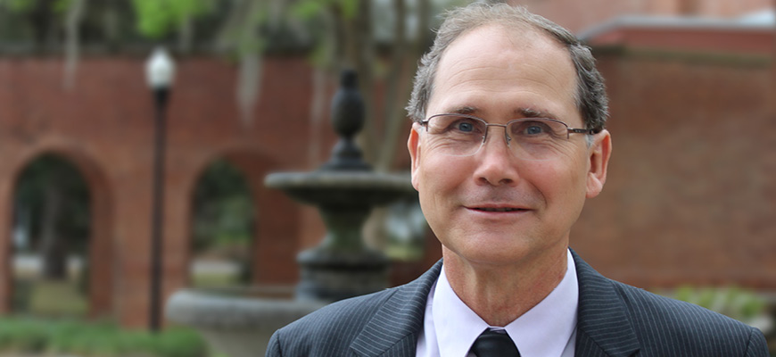 closeup photo of a man in a suit