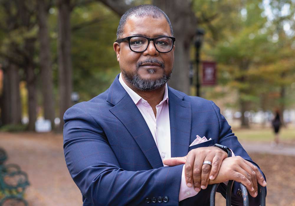 A portrait of Leroy Chapman with the USC Horseshoe in the background.