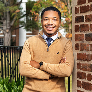 Keynan Kennedy leaning on a gate.