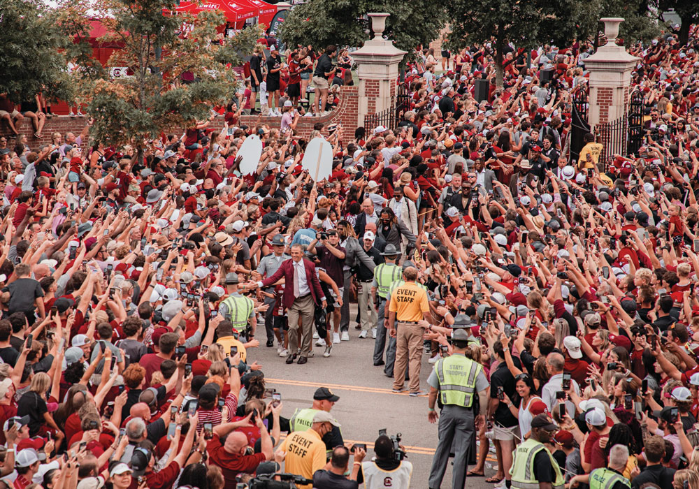 Shane Beamer makes his way through Gamecock Walk prior to a football game at Williams-Brice stadium.