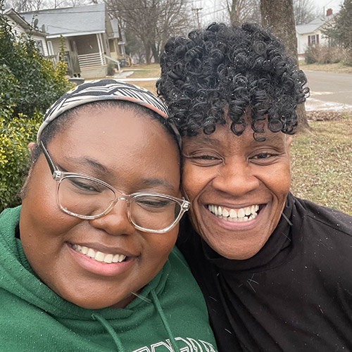 Renee Shaw and her daughter smiling. 