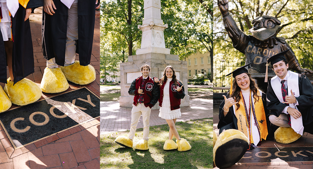 Nicole and John pose in their graduation gear wearing the large yellow Cocky feet.