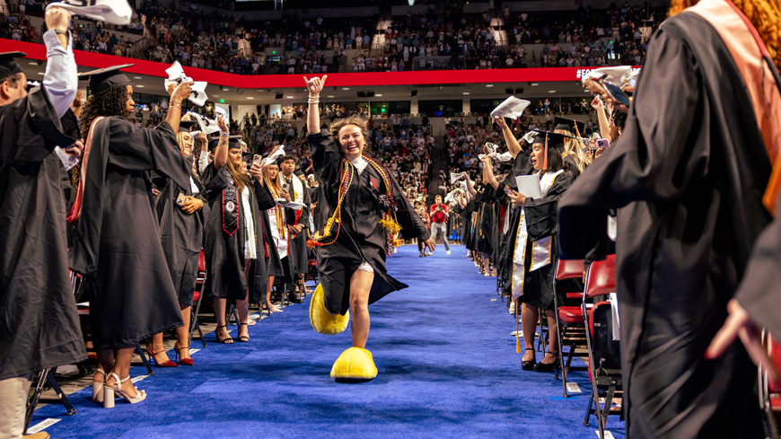 Nicole doing her last 2001 at graduation at Colonial Life Arena. 